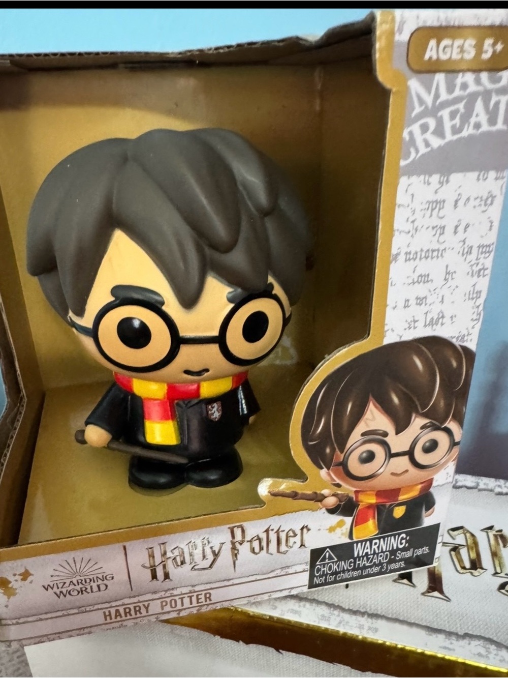 Warner Bros. Harry Potter Stylized Figure with Red and Yellow Scarf